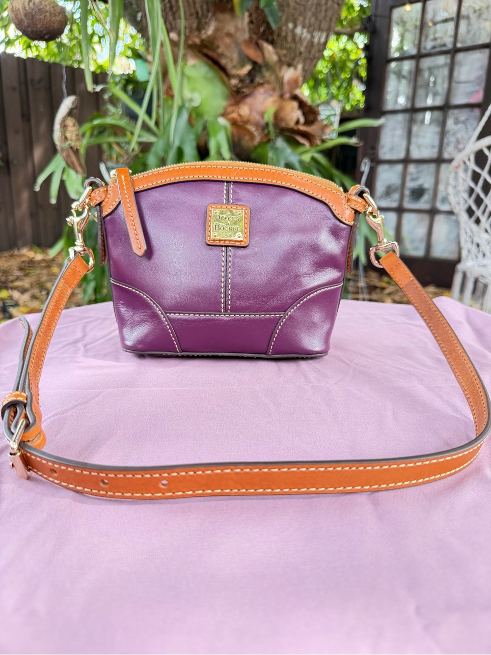 Dooney & Bourke Plum Leather Domed Crossbody with Tan Trim and Adjustable Strap